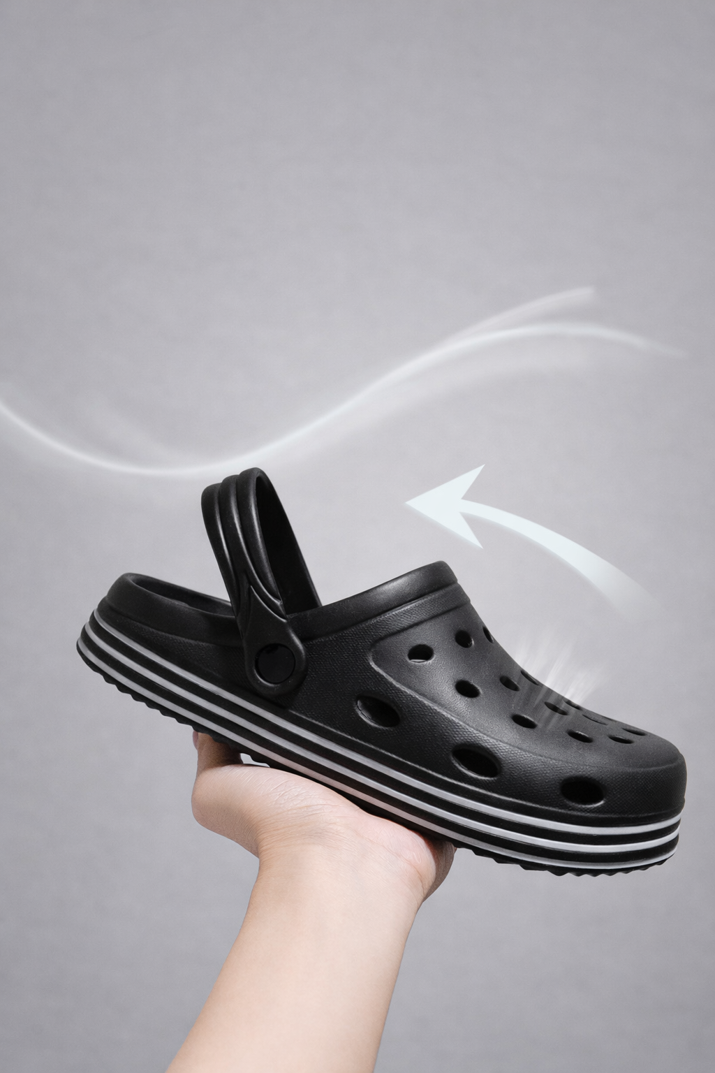 Lightweight men’s EVA clogs shown in hand, flexible and easy to wear