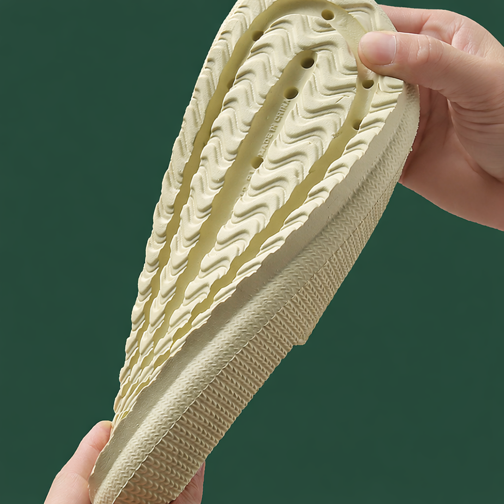 Anti-slip textured outsole of OAKAA comfort slides for secure grip