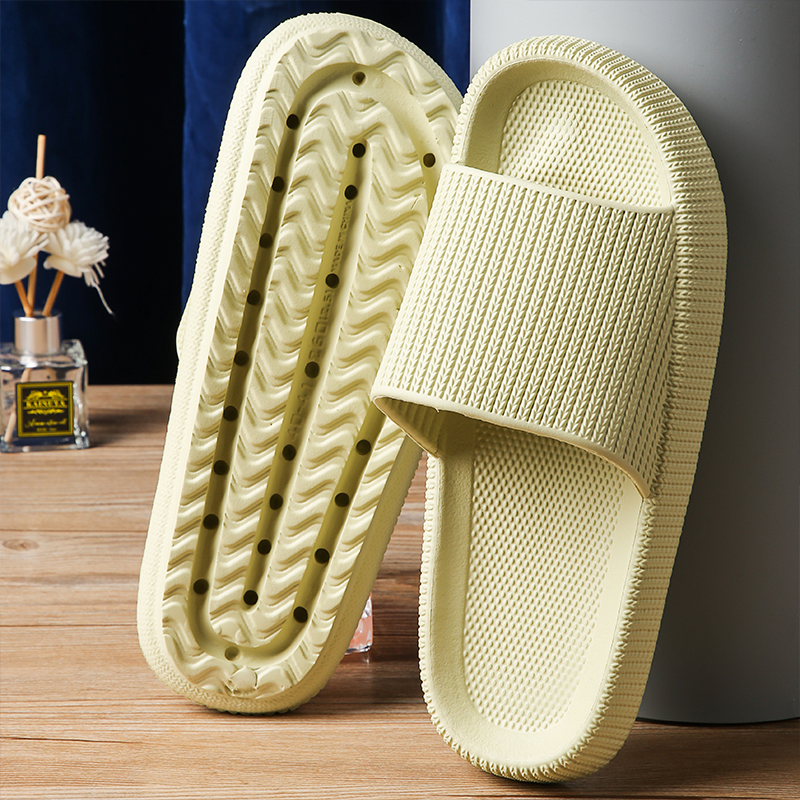 Thick sole comfort slippers showing anti-slip textured outsole and cushioned footbed design